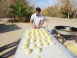 مراسم پخت و پخش نان روغنی«لتیرگ» در آموزشکده ملی مهارت دختران میبد  4